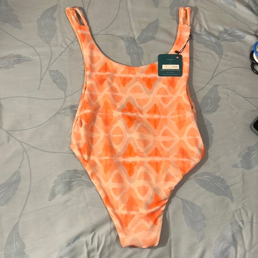 Sherbet orange reversible cream and orange print one piece